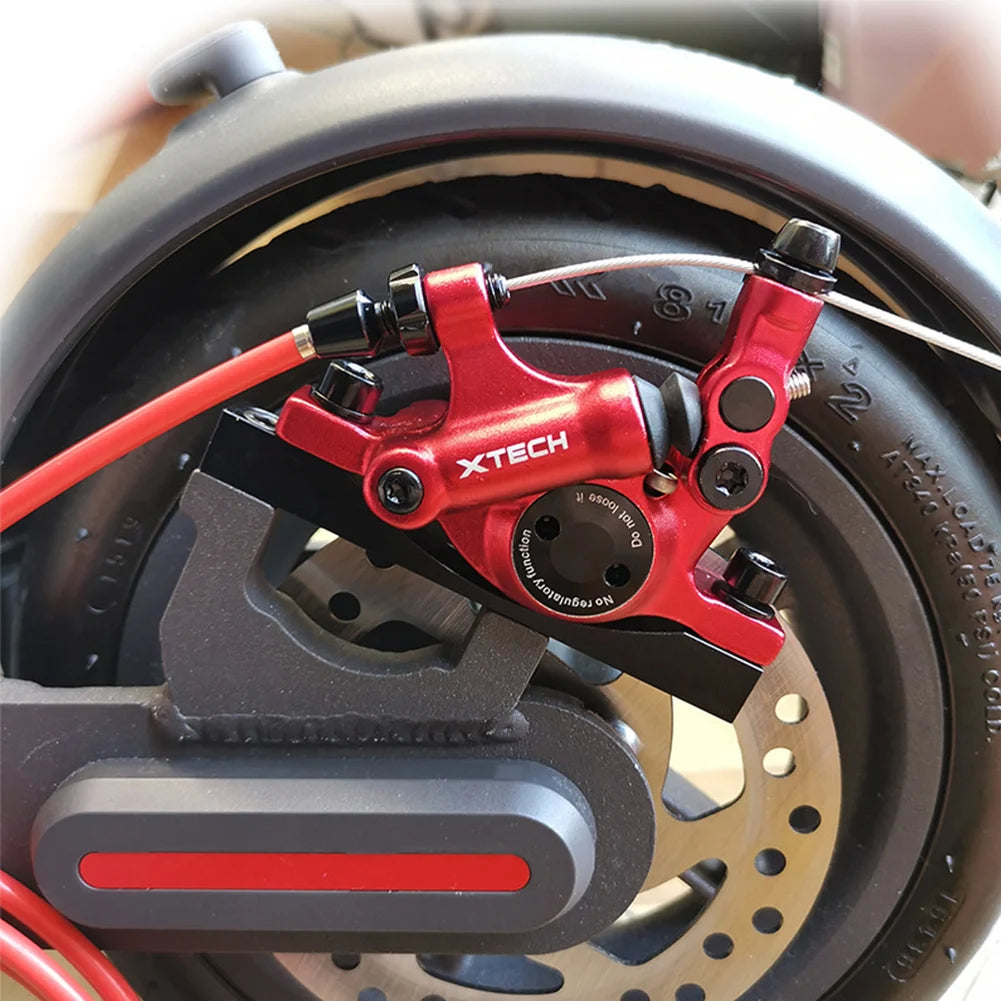 Complete Xtech brake kit for red electric scooter